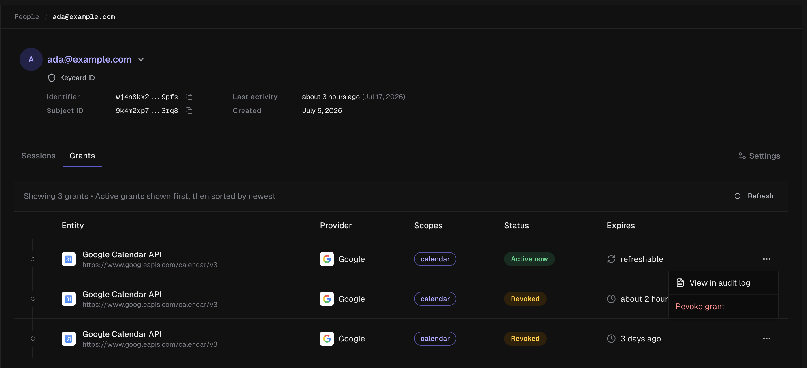 Grants tab on a person's profile with the actions menu open, showing View in audit log and Revoke grant