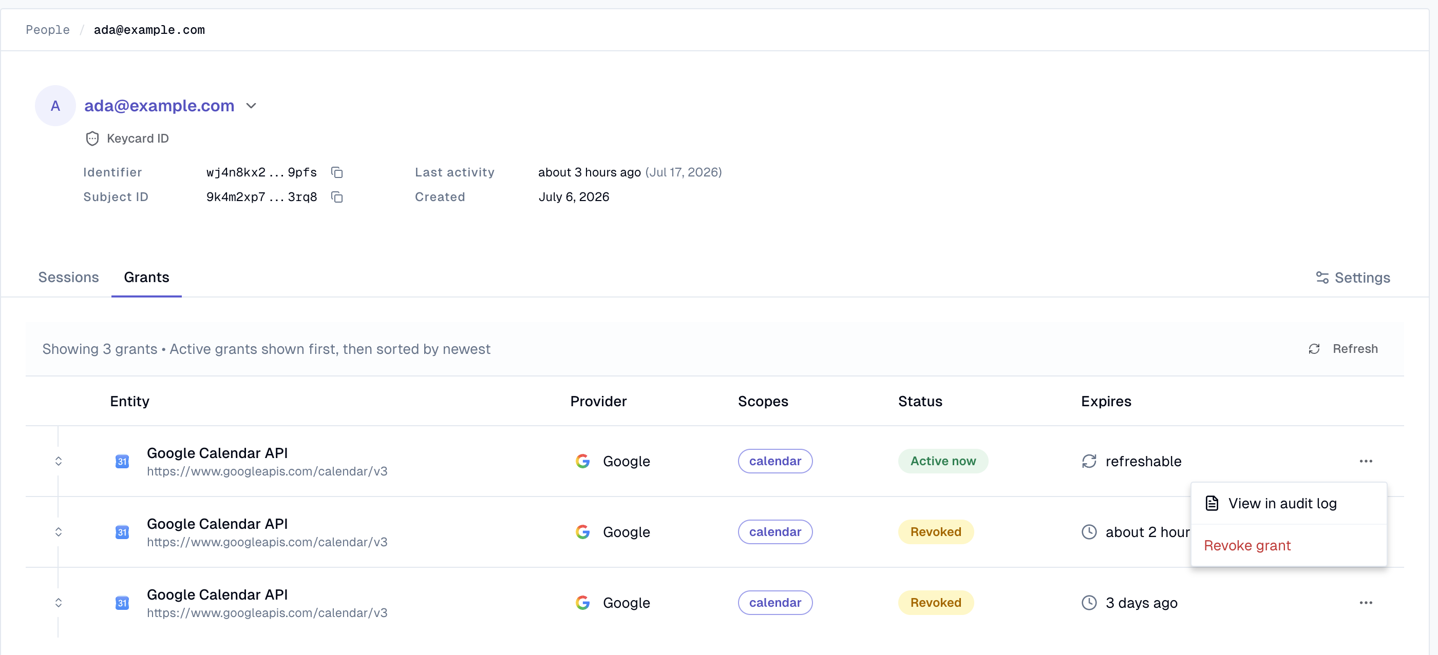Grants tab on a person's profile with the actions menu open, showing View in audit log and Revoke grant